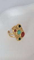 Anillo en acero dorado con incrustaciones
